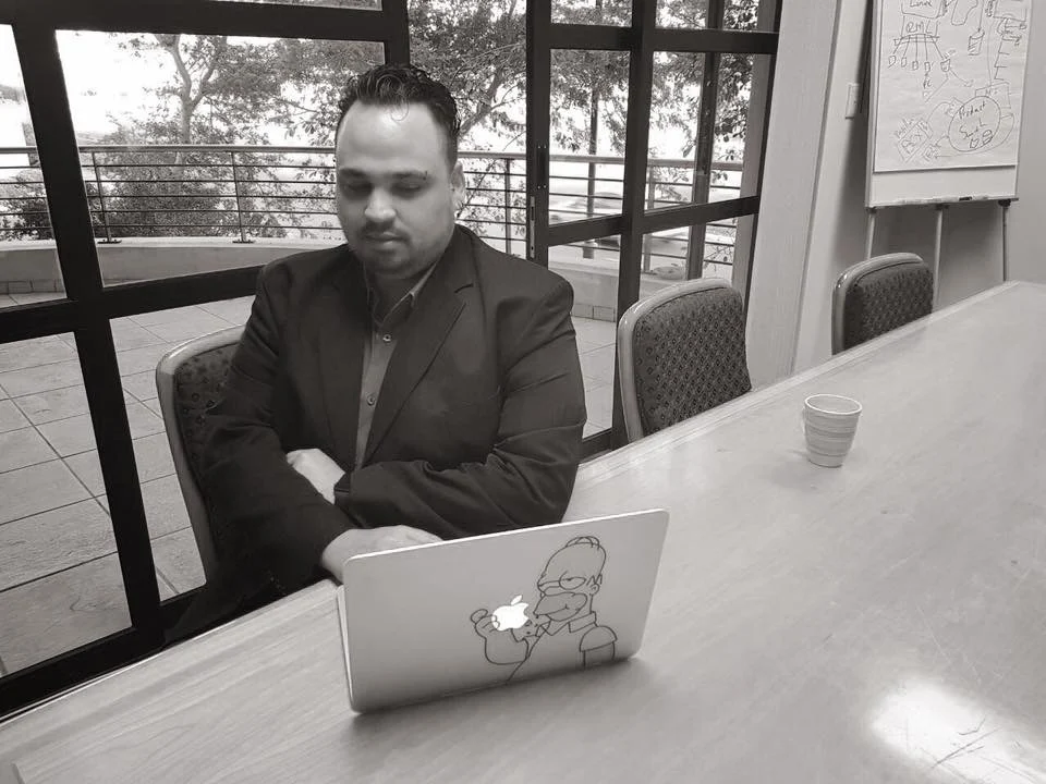 Sean Wyngaard at his laptop